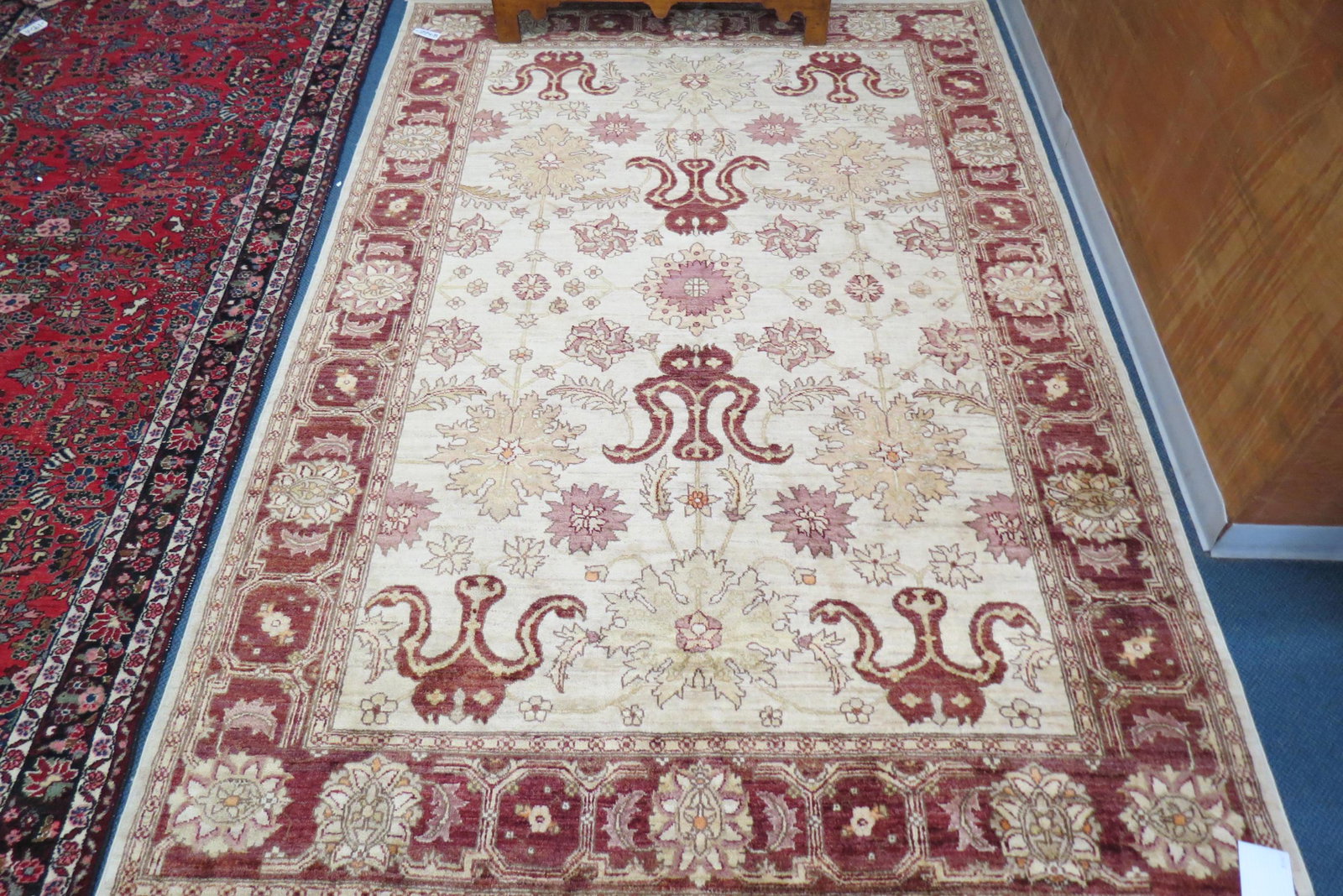 Oushak Turkish Handmade Rug,: floral designs on light tan field, fancy border, 6'1" X 9'.