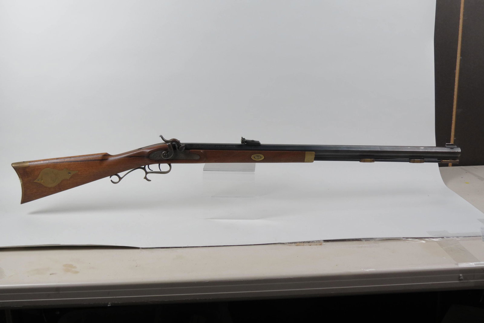 Black Powder Thompson Center Arms Rifle,: .54 caliber, "Hawken" model, Rochester New Hampshire, 45" long overall, brass compartment in wood stock.