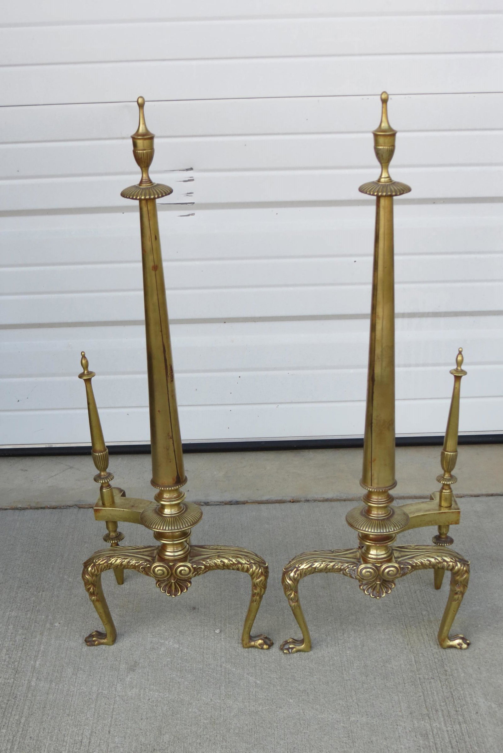 Pair of 19th Century Bronze Andirons,: Federal style, urn at top of tapered column, lion paw feet, 28 1/2" tall.