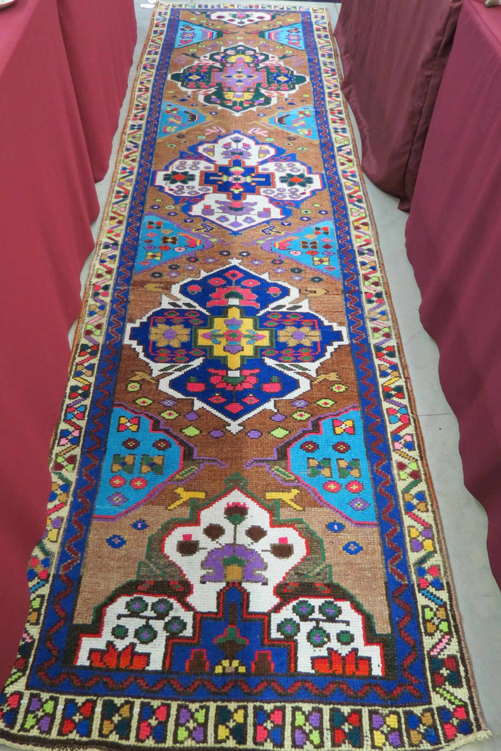 Heriz Persian Handmade Runner, colorful: geometric designs and stylized florals on light salmon field, 3'4" X 12'3".