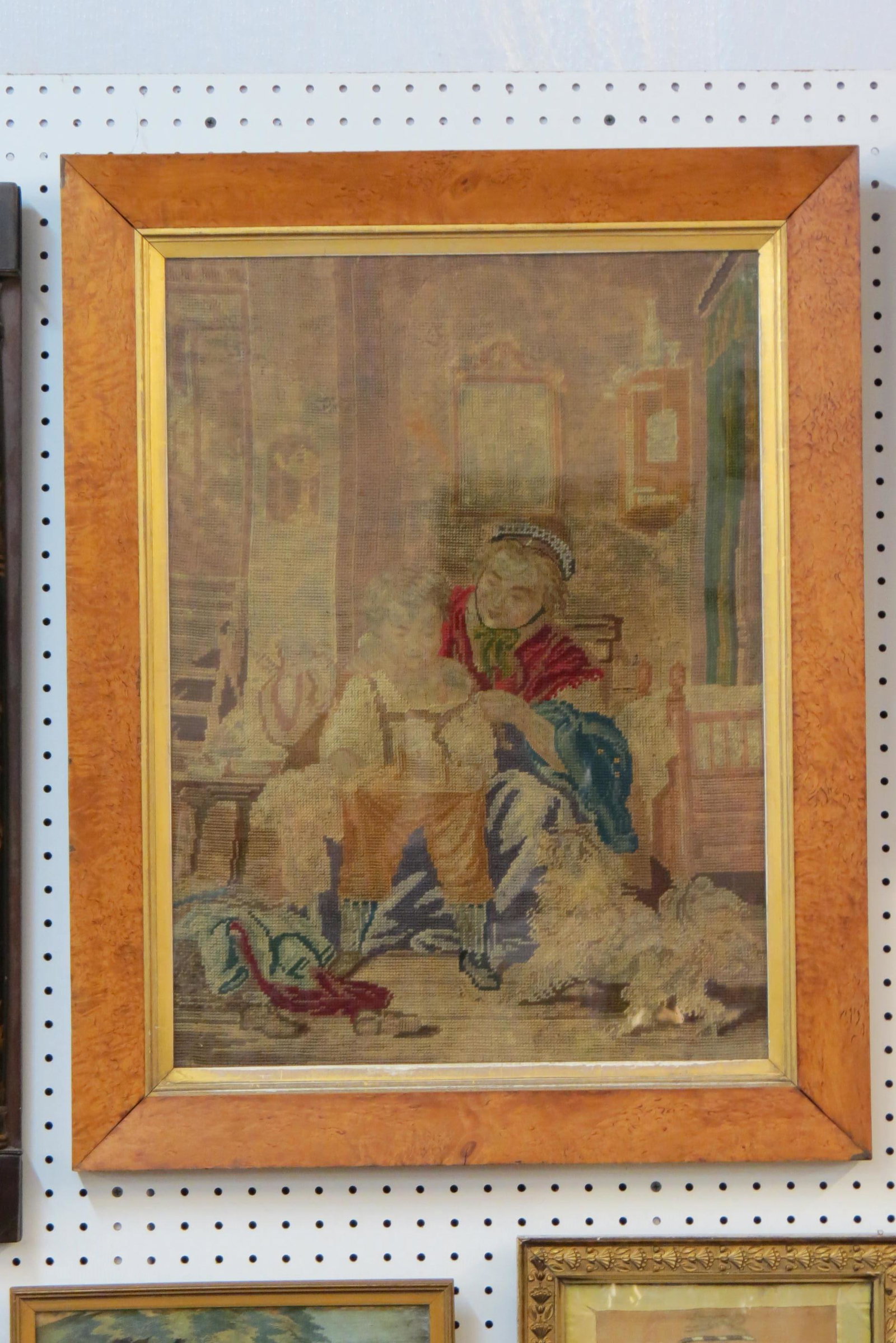 19th Century Framed Needlework of Mother & Boy,: dog at their side, 18" X 24" plus curly maple frame.