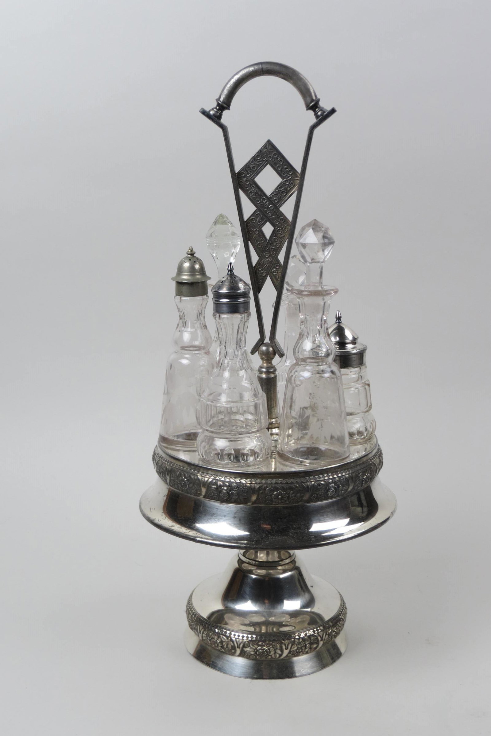Silverplate & Crystal Castor & Cruet Set,: center handle, late 19th century, 18" tall.