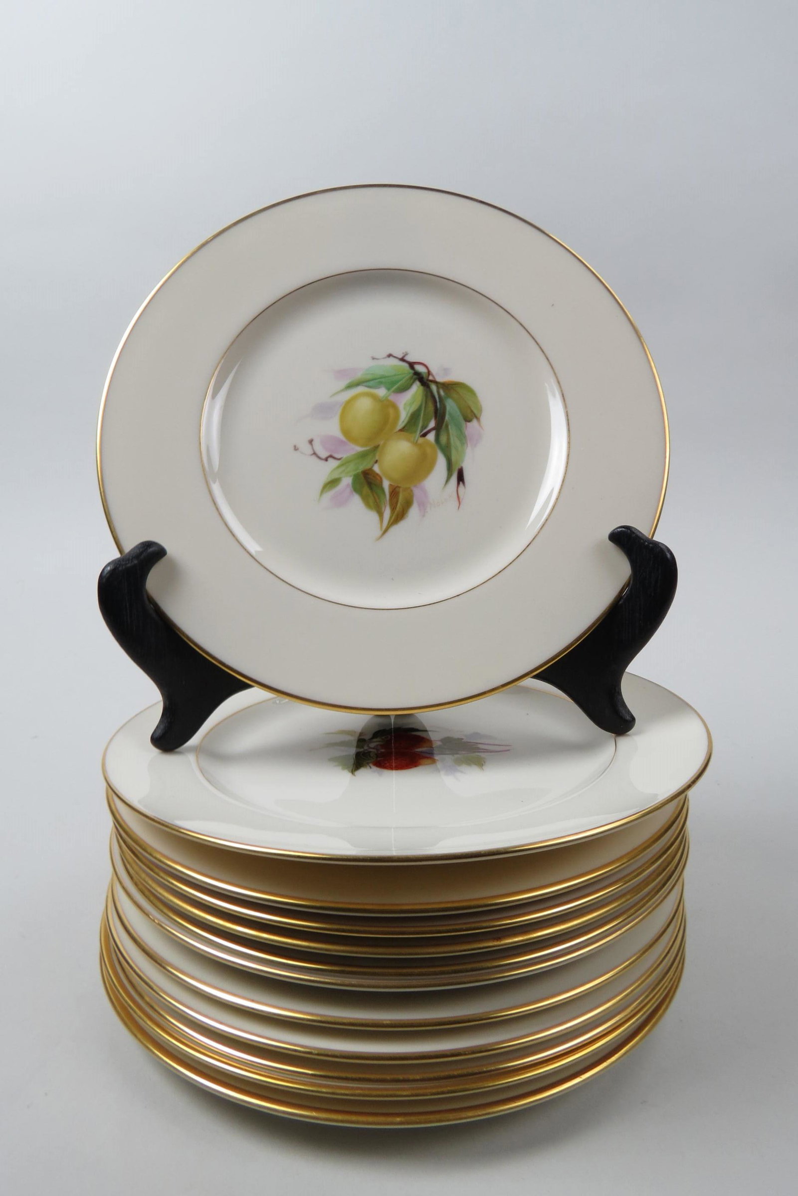 12 Lenox China Dessert or Sald Plates,: different fruit decor on ivory, gold trim, 8 1/4", excellent.