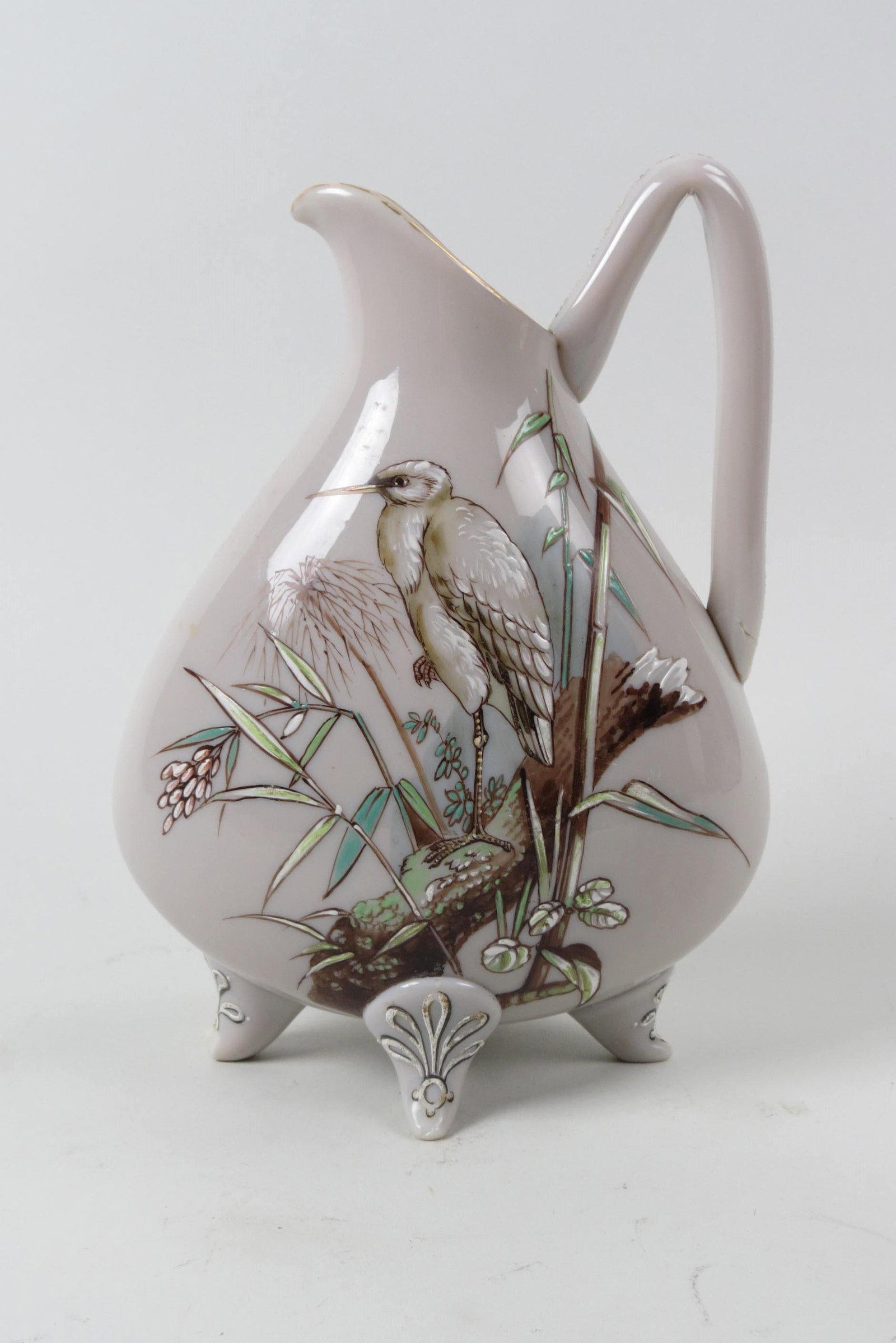 Victorian Art Glass Vase with Crane,: enameled on beige, footed, ewer form, 10",