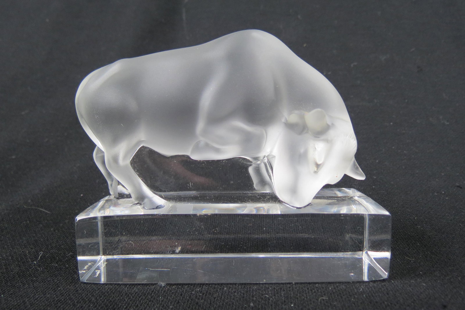 Lalique Crystal Figurine of a Bull,: frosted, 3 1/2" tall, 4 1/4" long, signed, excellent.