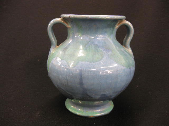 Early Cole North Carolina Pottery Vase,: blue-green slip glaze, handled, 5 1/2", signed, excellent.About fifty miles from Seagrove, but very close to the Seagrove tradition, is Cole’s Pottery in Sanford. Potters Neolia Cole Womack and Celi