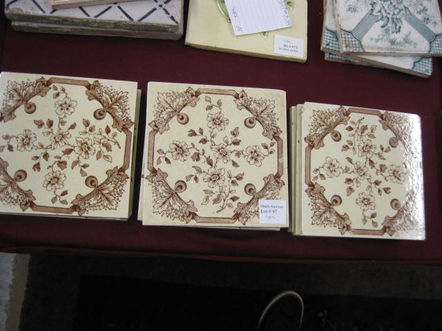 11 pc. Pottery Tile Set,: brown floral on ivory field, 6" square.