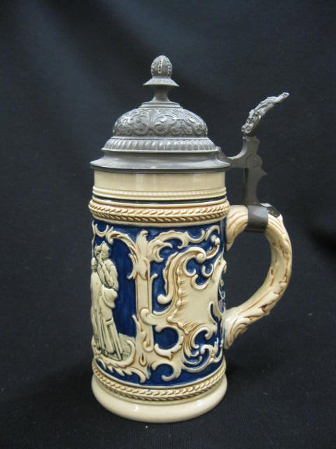 German Pottery Stein, bas-relief, festive: scene, cobalt trim, 8" tall, excellent
