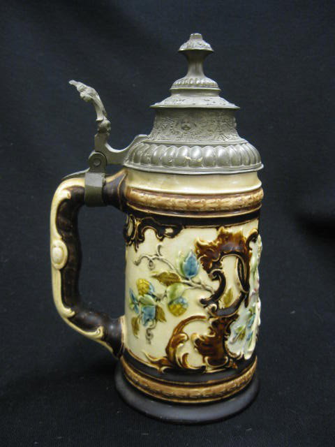 German Pottery Stein, cherub decor,: pewter lid, 3/10 liter, 8" tall