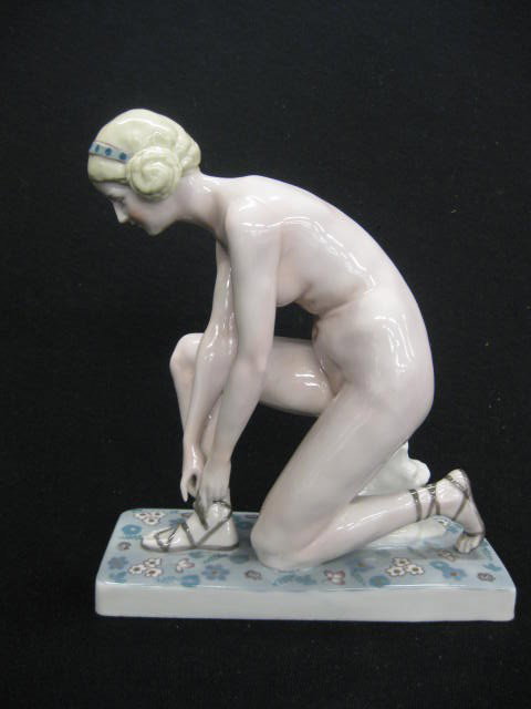 Early Goebel Porcelain Figurine of a Nude lady: at rest retying her sandal, crown mark, 7 1/4" tall, made around the time of the 1932 Olympics, excellent....The Goebel Company, based in Rödental, northern Bavaria, has been creating fine porcelain 