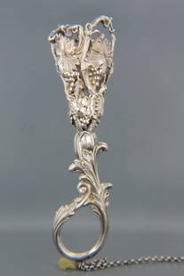 European Silver Tussey Mussey Posey Holder,: 19th century, grape and vine decor, unmarked, tests .800 fine silver, 5" plus chain and finger ring......During Queen Victoria's reign (1837-1901), it became fashionable to carry a small nosegay or