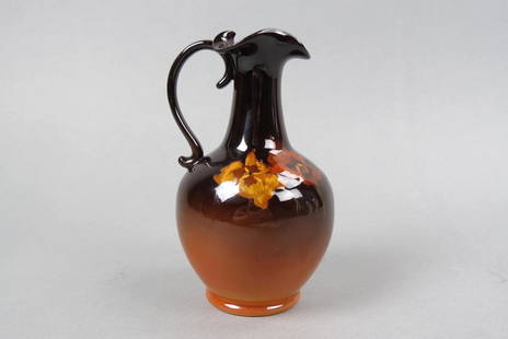 Rookwood Pottery Vase by Sallie E. Coyne, 1900,: pansy decor, standard glaze, ewer shape #777, handled, 6", excellent.....Sarah Elizabeth Coyne, often called "Sallie", was born in 1876. She began working at the Rookwood Pottery in 1891 at the age