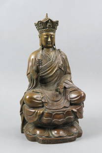 Chinese Bronze Statue of a Buddha,: seated on lotus blossom style base, 16" tall.