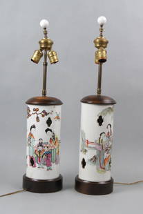 Pair of Chinese Porcelain Lamps,: Republic period (?), with figures, butterflies and floral, openwork in cylindrical 11" bodies, originally wig stands, wooden bases and caps.