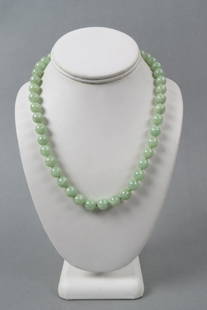 Jade Bead & 14K Gold Necklace,: 44 beads measuring 10 mm each, 14K yellow gold clasp, 74 grams, 19" long.