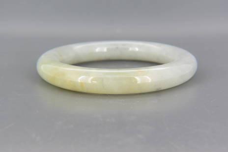 Jade Bangle Bracelet,: gray-white with some light russet coloring, 75 grams, 12 mm with 7" interior measurement.