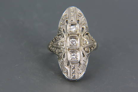 Platinum & Diamond Art Deco Ring,: 13 round diamonds totaling over .40 carat in platinum filigree setting with a 14K white gold shank, currently size 6 1/2.