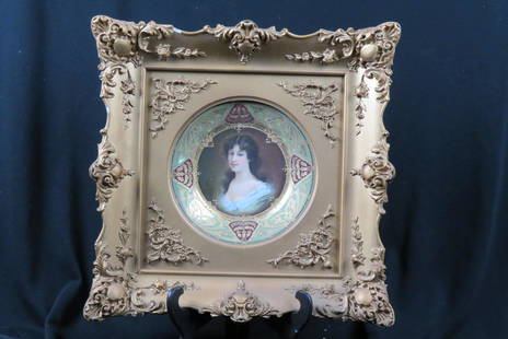 Framed Royal Vienna Style Portrait Plate "Beauty",: young lady in center with iridescent and gold border, 10" diameter, in gold frame, overall 18 1/2" X 18 1/2", late 19th century.