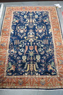 Fine Persian Handmade Rug,: fancy florals on rich blue field, salmon border, 4'1" X 5'10".