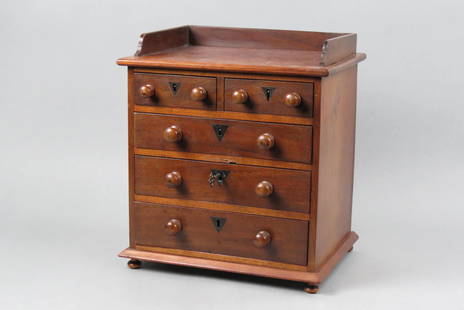 Salesman Sample or Doll Size Chest,: 2 over 3 drawer with gallery top, locking, bun feet, 14" tall, 12 1/2" wide, 9 1/4" deep, circa 1880, with key.