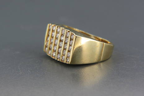 Men's Diamond & 14K Gold Ring,: 30 round diamonds totaling 1 carat in yellow gold, with appraisal of $3,000.00, currently size 9 1/2 with ball interior mounts.