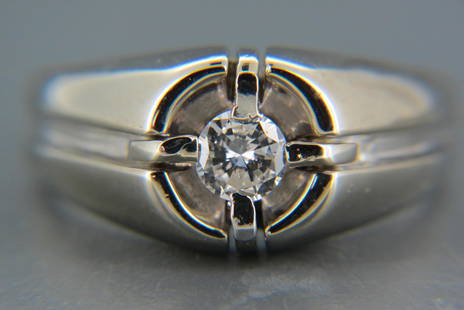 Men's Diamond Solitaire 14K Gold Ring,: round diamond weighing .40 carat in 14K white gold, with appraisal of $3,000.00, currently size 8 3/4'.