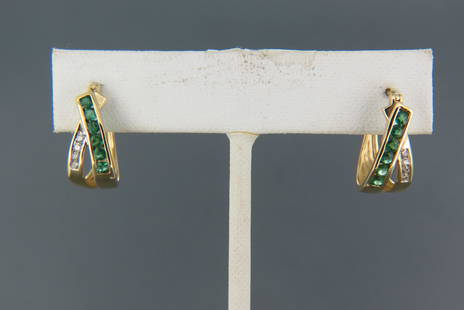 Emerald & Diamond 14K Gold Earrings,: 12 round emeralds totaling .60 carat and 8 round diamonds totaling .12 carat in yellow gold, with appraisal of $750.00, pivot post and clip closures.