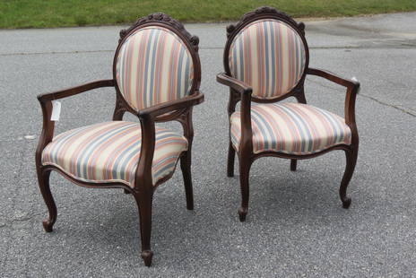 Pair of Carved Rosewood Arm Chairs,: medallion back with carved roses above, colorful stripe upholstery.