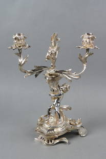 Fine Silverplate Candelabra with Child on Base,: triple sconce, converts to candlestick, 14" tall, 11" wide, 10th century.