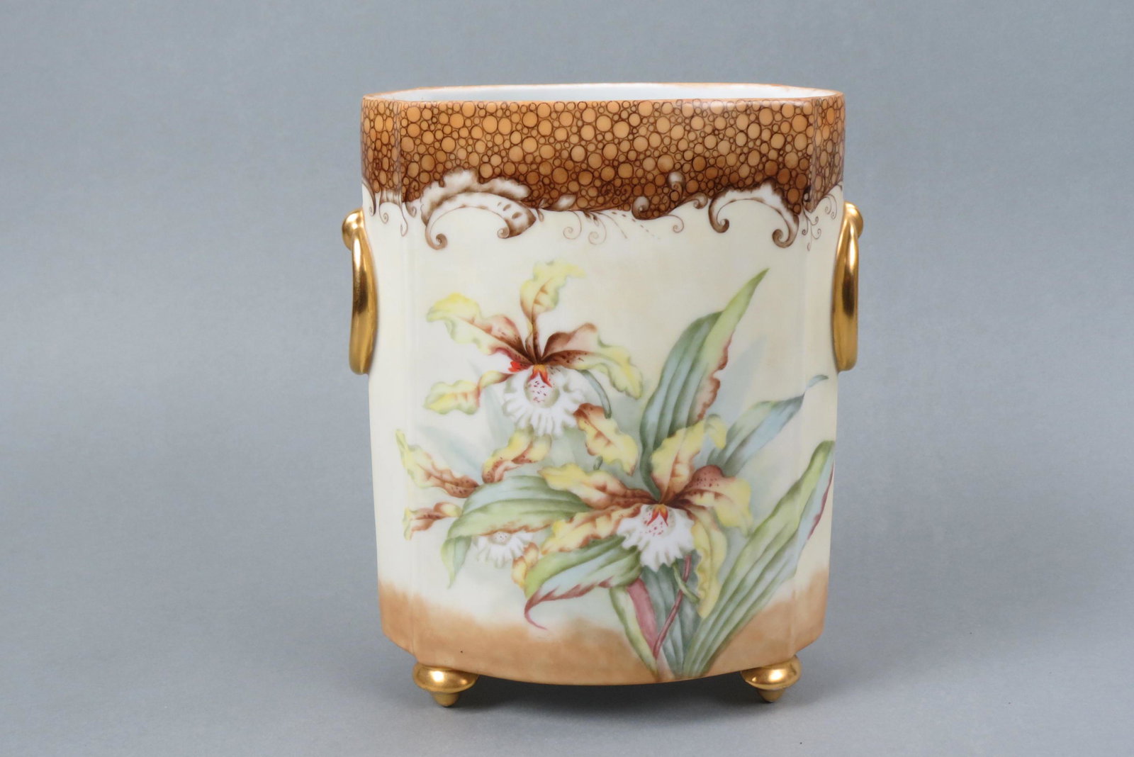 Hand Painted Porcelain Vase with Orchids,: gold handles and feet, probaly Limoges, 9" tall, excellent.