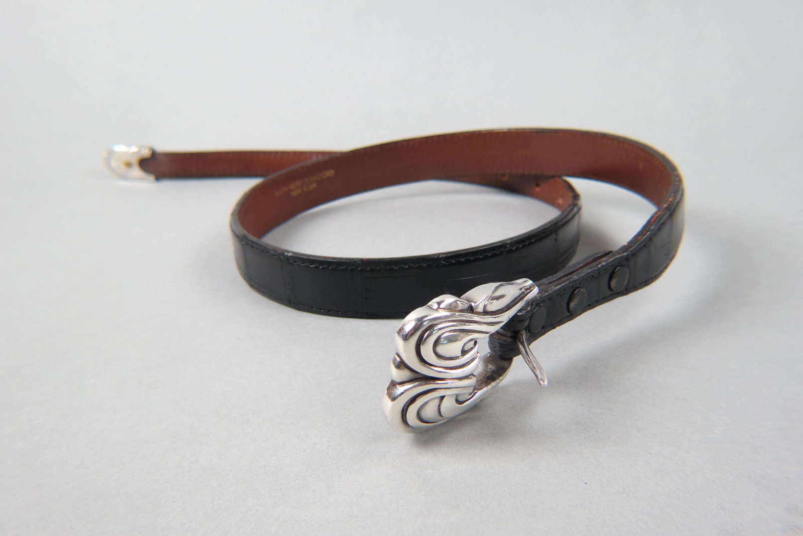 Kieselstein-Cord Sterling & Leather Belt,: #254, buckle measures 2 1/8" X 1 5/8" on tapered style original leather belt, all signed, holes for 27 1/2" to 35".