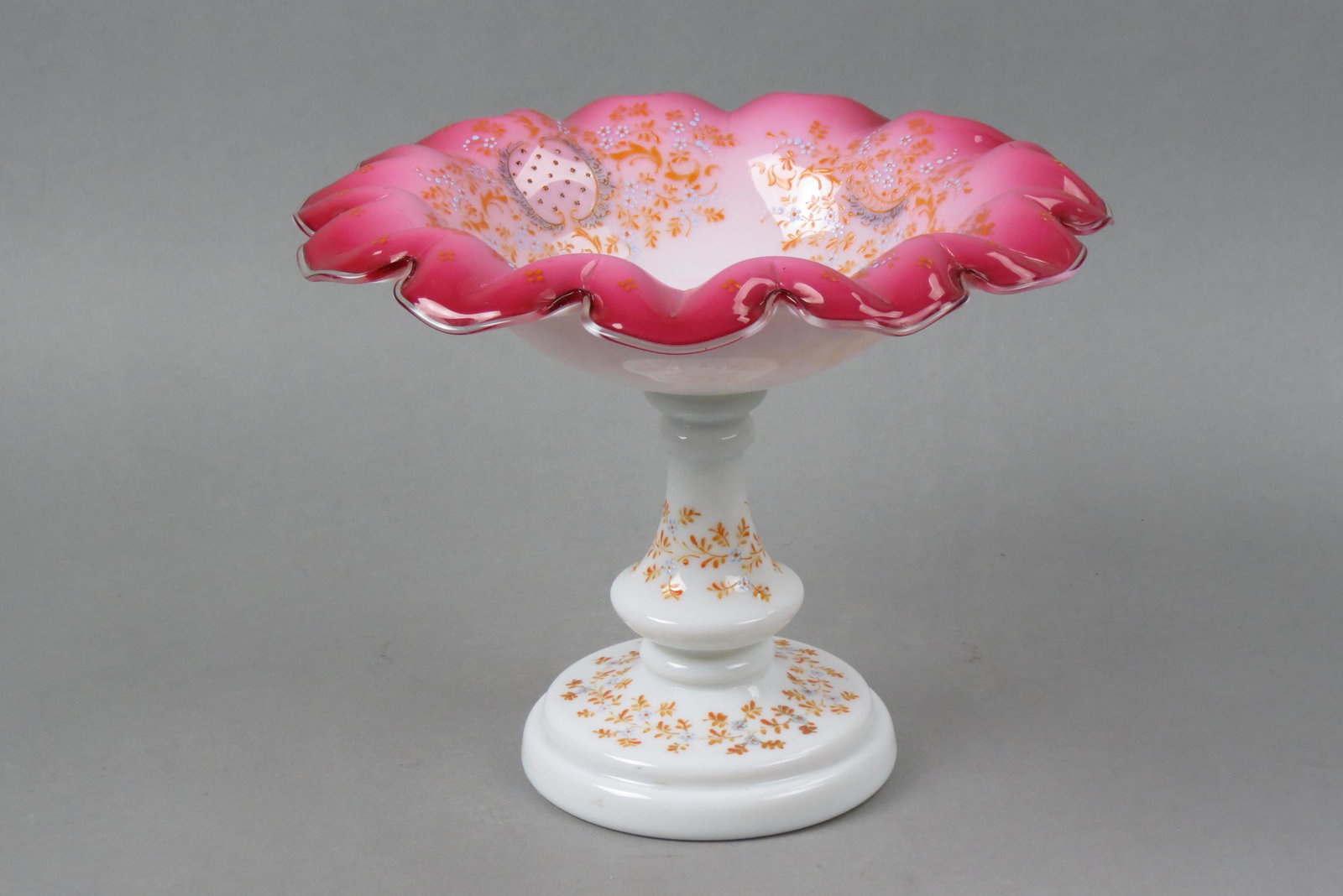 Cranberry to White Art Glass Compote,: enameled floral and fancy designs, centerpiece size, wavy cranberry rim, tall pedestal, 11 1/2" diameter, 9 1/2" tall, circa 1880, excellent.