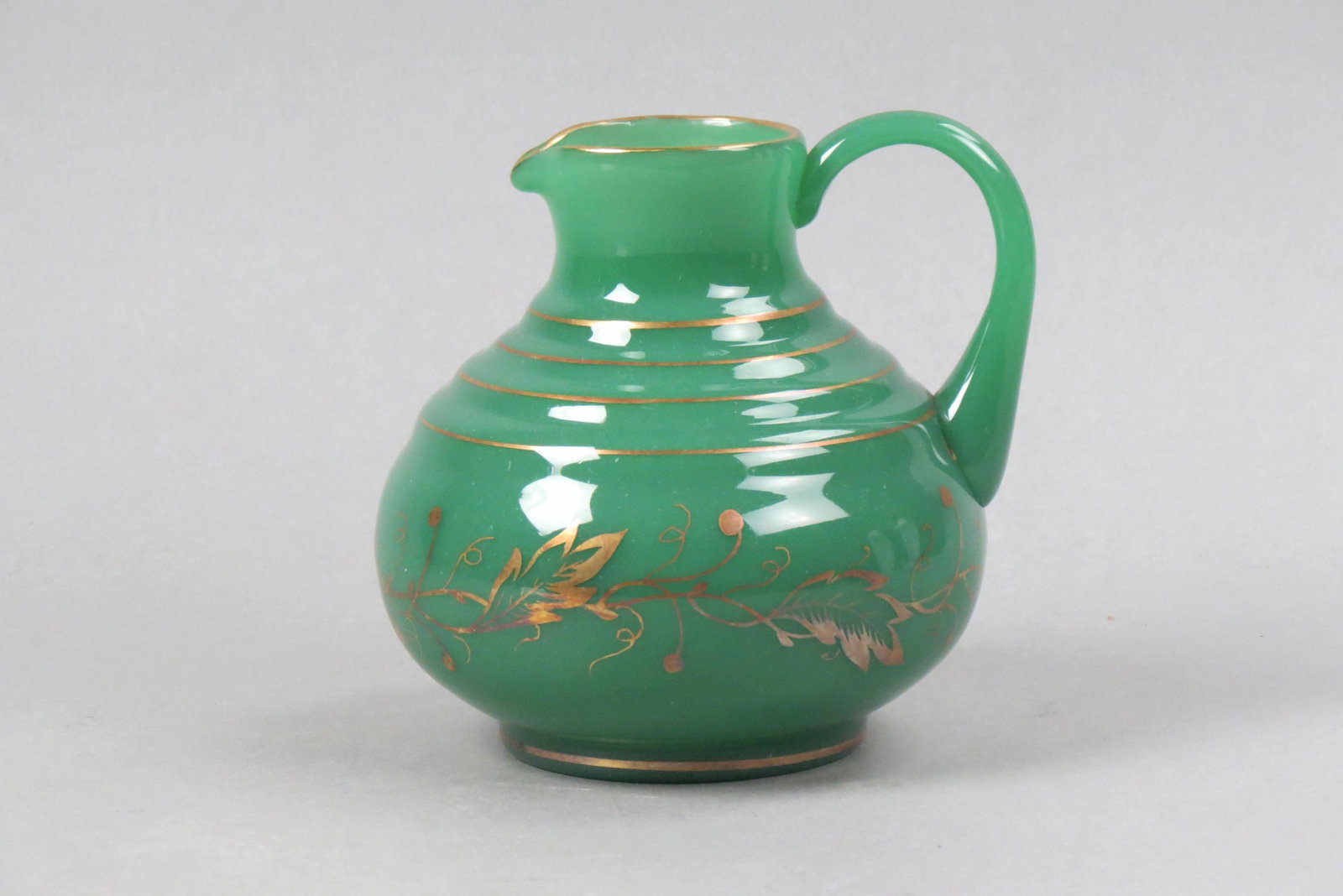 Jade Green Art Glass Pitcher,: gold vine and band design, handblown, in manner of Steuben, 6", excellent.