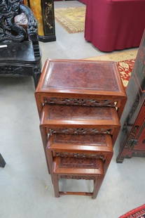 Chinese Carved Nest of Tables,: fighting dragons design, fine burl tops, smallest is 9" X 10", 16" tall and largest of the four is 14" X 18" top and 26" tall.