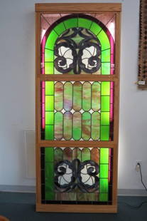 Large Stained Glass Window, 3 parts, overall 38" X 97",: with mottled purples, greens, blues, white and more, currently housed in a custom oak frame, backlit, overall 38 3/4" X 97".