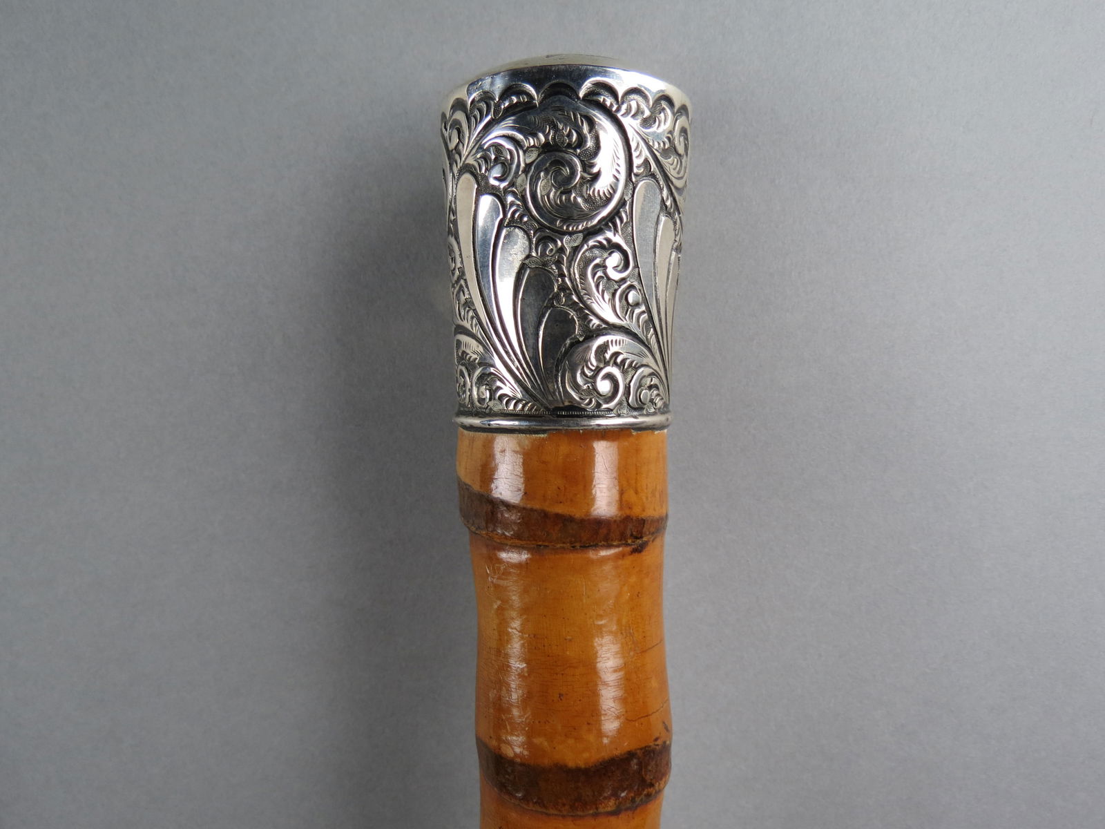 Sterling Top Walking Stick, fine repousse work, on thick bamboo shaft, overall 37" long, late 19th (1 of 6)