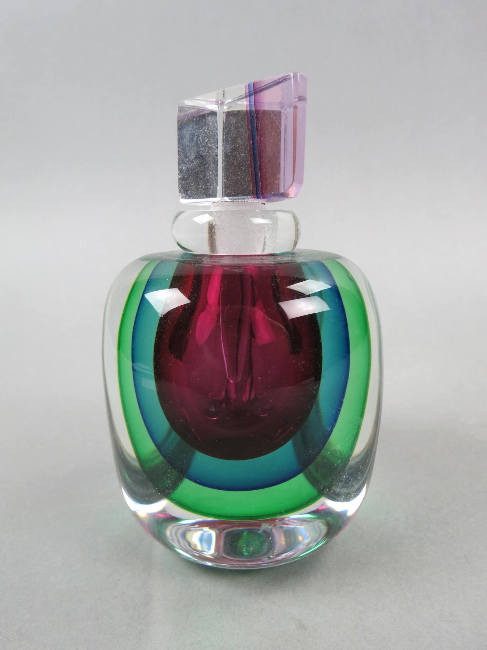 Studio Art Glass Perfume Bottle, internal ruby, sapphire and emerald colors within  clear body with (1 of 5)