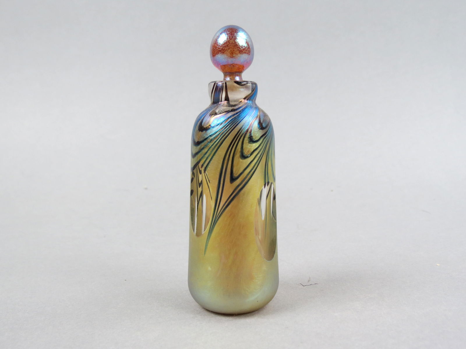 Studio Art Glass Perfume Bottle, swirling vine on golden iridescent, thumbprint cut  decor, 4 1/4", (1 of 4)