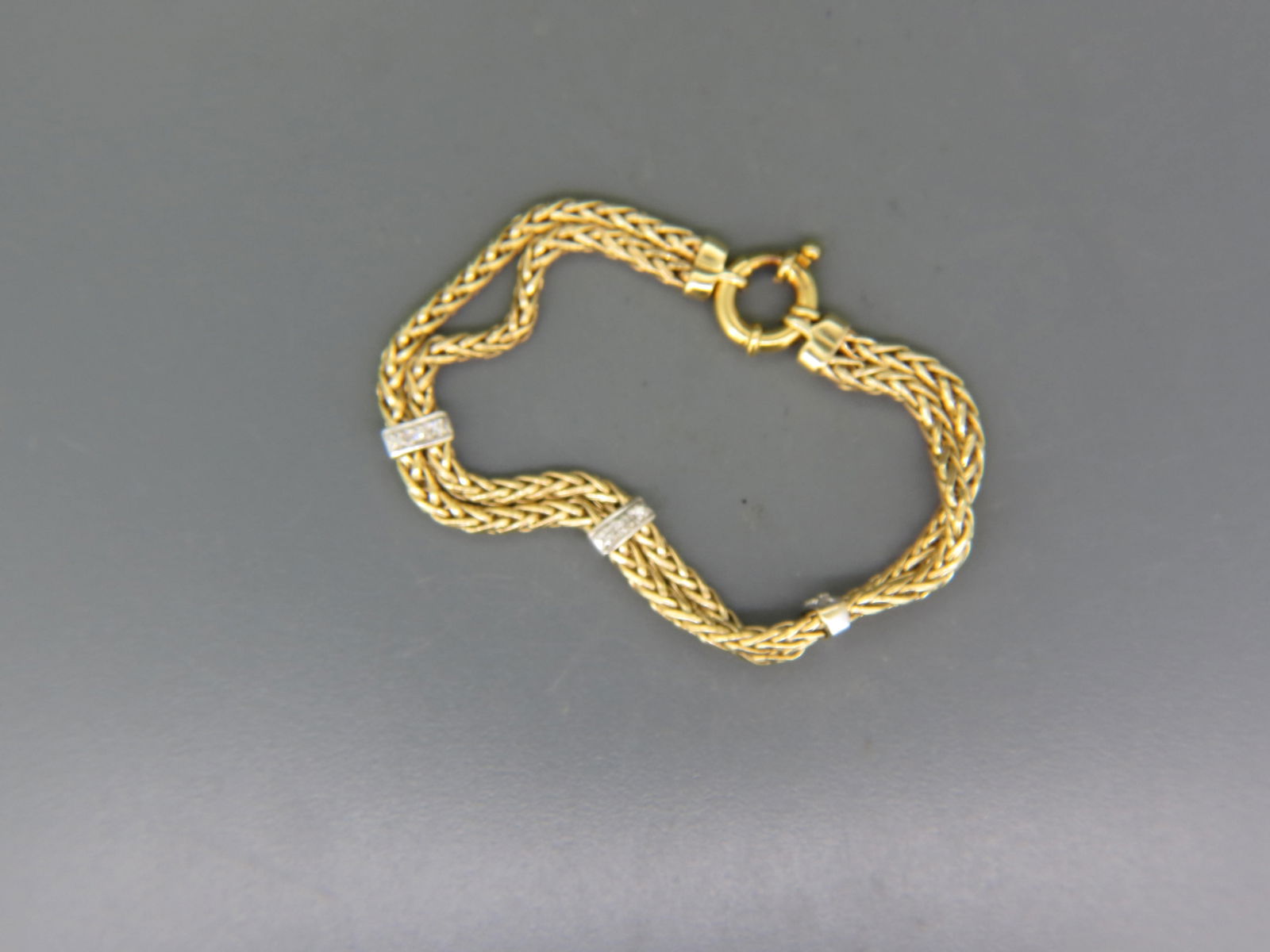 Diamond & 14K Gold Bracelet, double braided design with a trio of bands each  having three round (1 of 6)