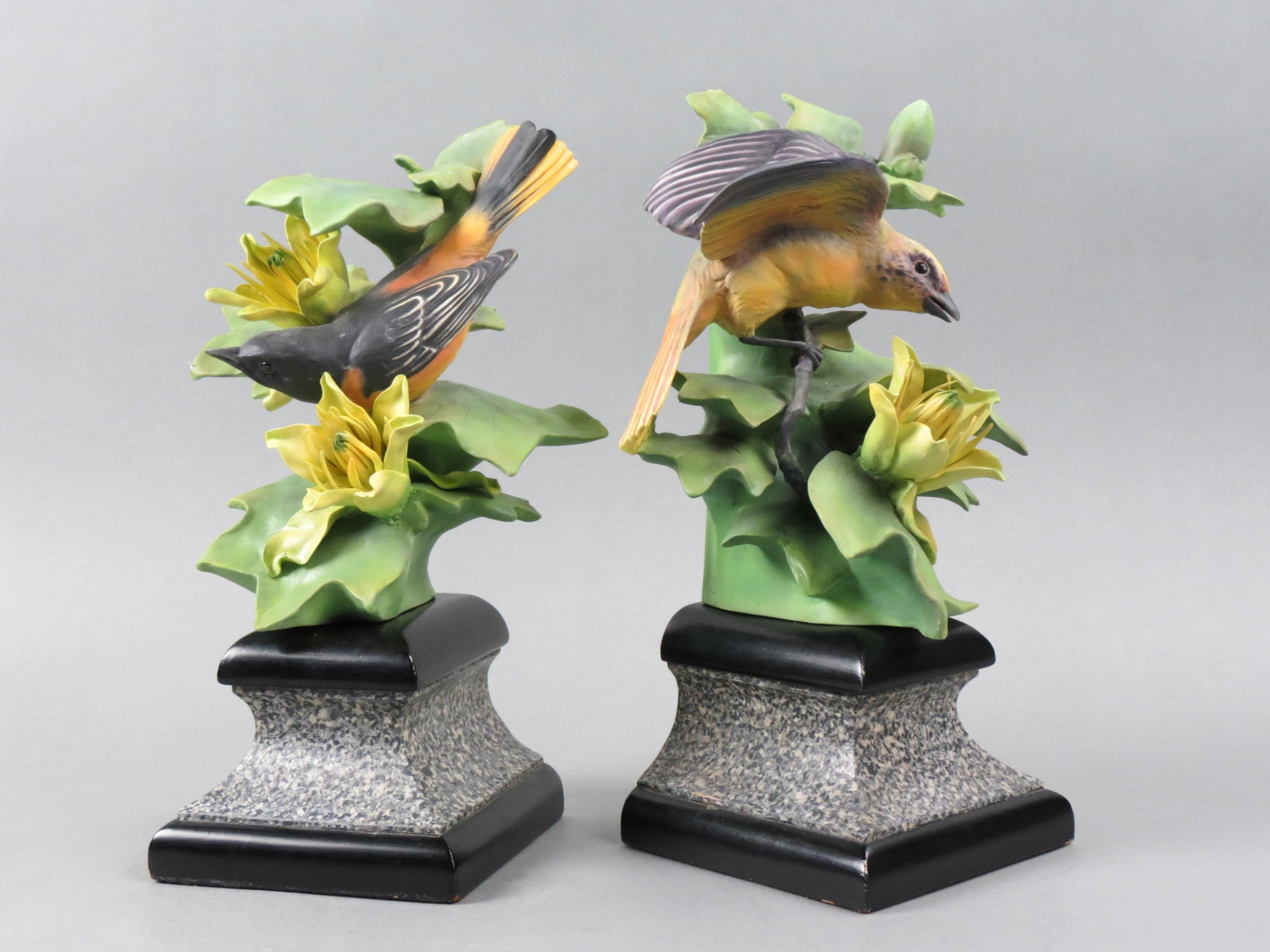 Pair of Royal Worcester Birds by Dorothy Doughty, "Baltimore Orioles & Tulip Tree", male and female,: Pair of Royal Worcester Birds by Dorothy Doughty, "Baltimore Orioles & Tulip Tree", male and female, issued in 1938, colored version, 9 1/2" plus bases, a scarcer pair, only 250 made. In 1980 Sole Rep