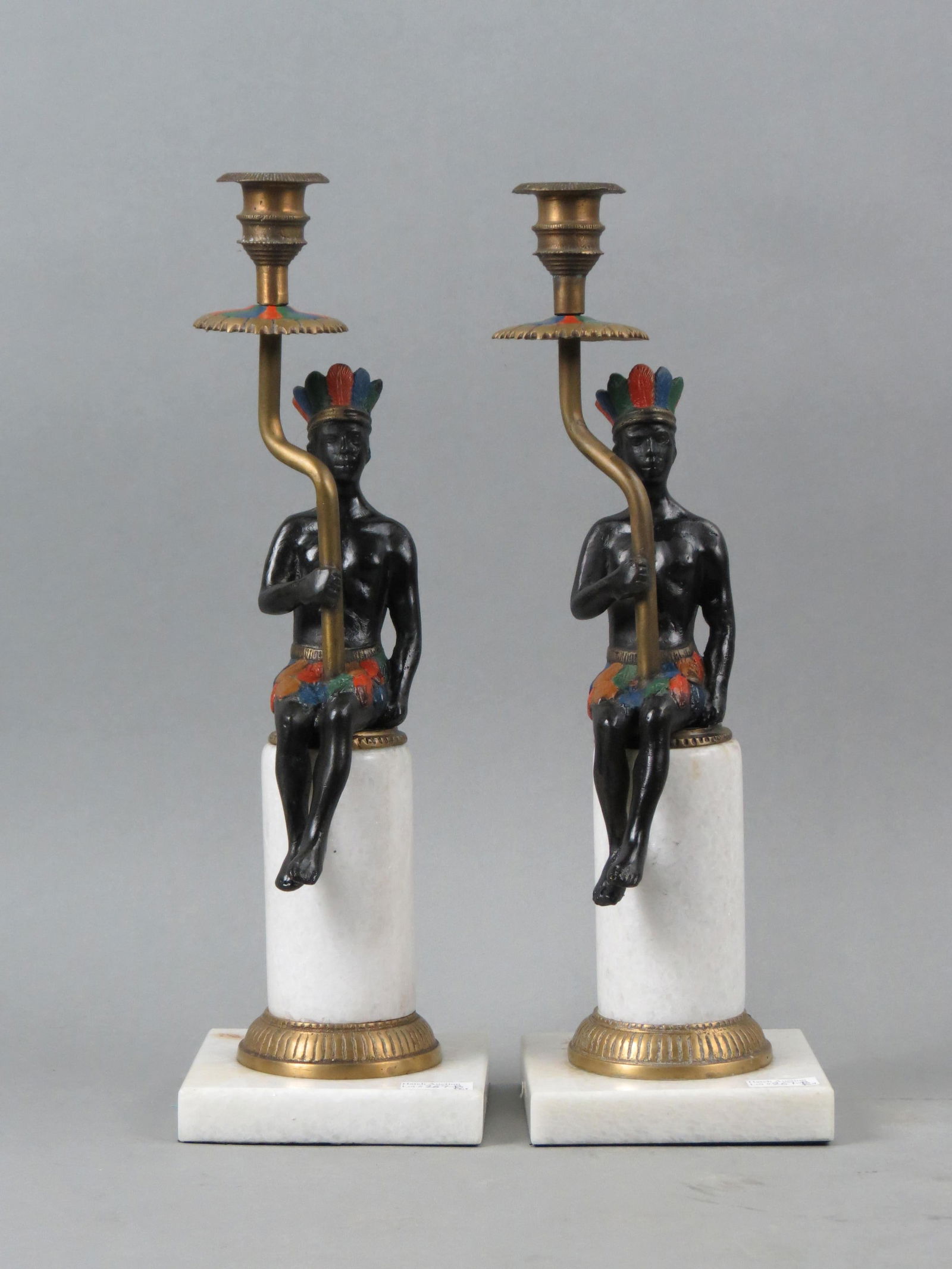 Pair of Nubian Style Bronze Figural Candlesticks, seated black males wearing crowns holding a rod (1 of 4)