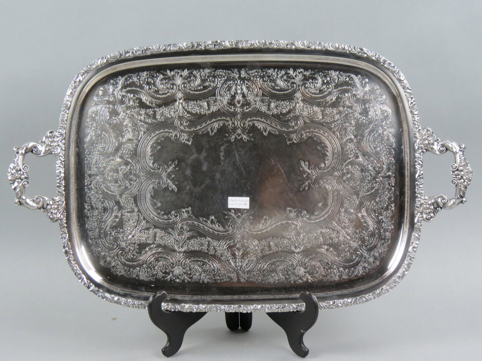 Silverplate Tray by International, fine floral engravinged design with berry and vine border, 16" X: Silverplate Tray by International, fine floral engravinged design with berry and vine border, 16" X 21" plus handles.