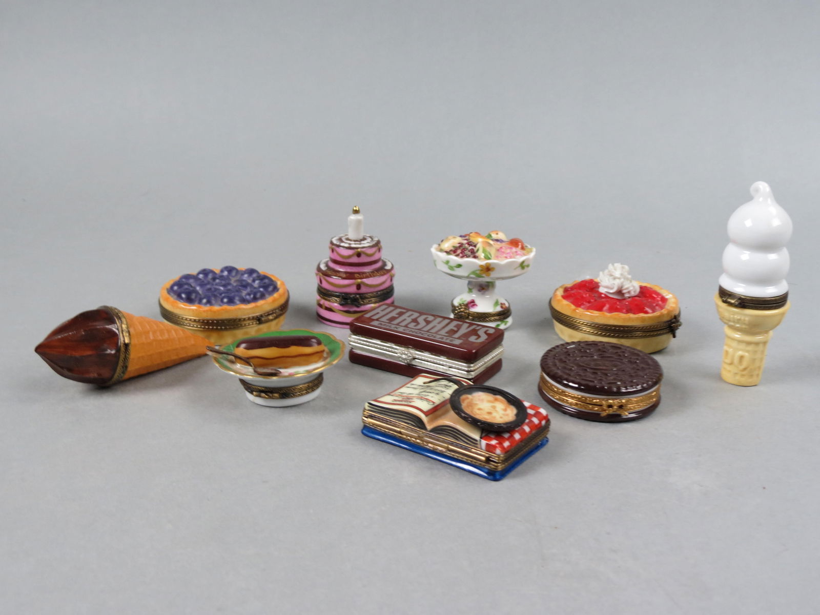 10 Figural Porcelain Boxes by Limoges & others, includes figural ice cream cones, pies, book, (1 of 9)