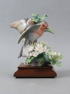 Royal Worcester Bird Figurine by Dorothy Doughty, "Chaffinch and May", #25, issued in 1978, 7 1/2": Royal Worcester Bird Figurine by Dorothy Doughty, "Chaffinch and May", #25, issued in 1978, 7 1/2" plus wooden base.....Throughout its rich history, Royal Worcester became synonymous with the producti