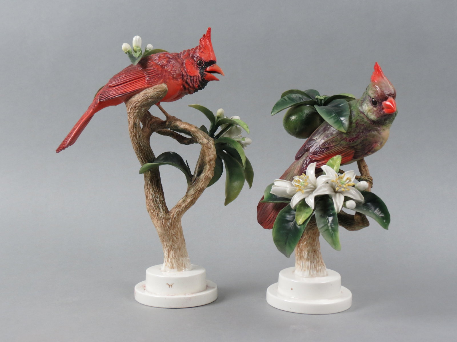 Pair of Royal Worcester Birds by Dorothy Doughty, "Virginian Cardinals & Orange Blossoms", male and: Pair of Royal Worcester Birds by Dorothy Doughty, "Virginian Cardinals & Orange Blossoms", male and female, issued in 1937, 11 1/2" tall, with original wooden boxes. a scarcer pair, only 500 made. In 