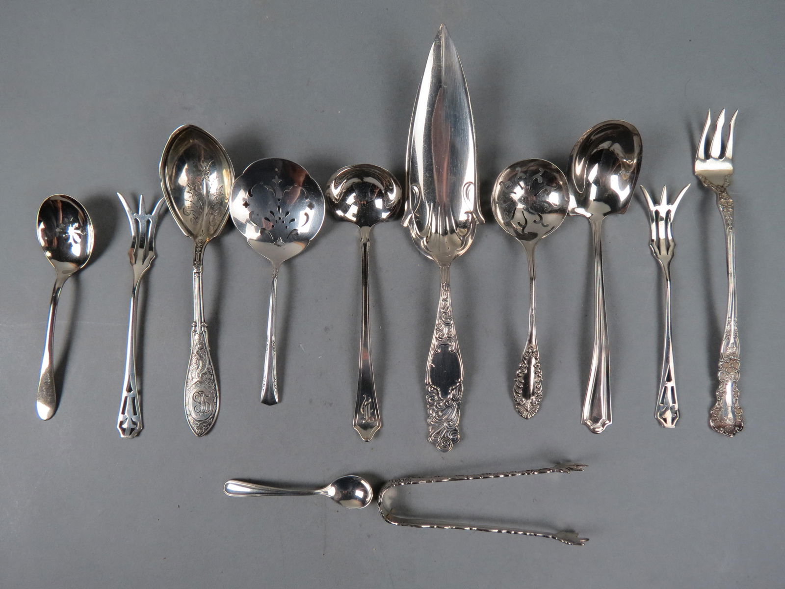 12 Sterling Silver Serving Pieces; includes jelly slice, sauce ladle, nut spoon,  tongs, pickle (1 of 5)