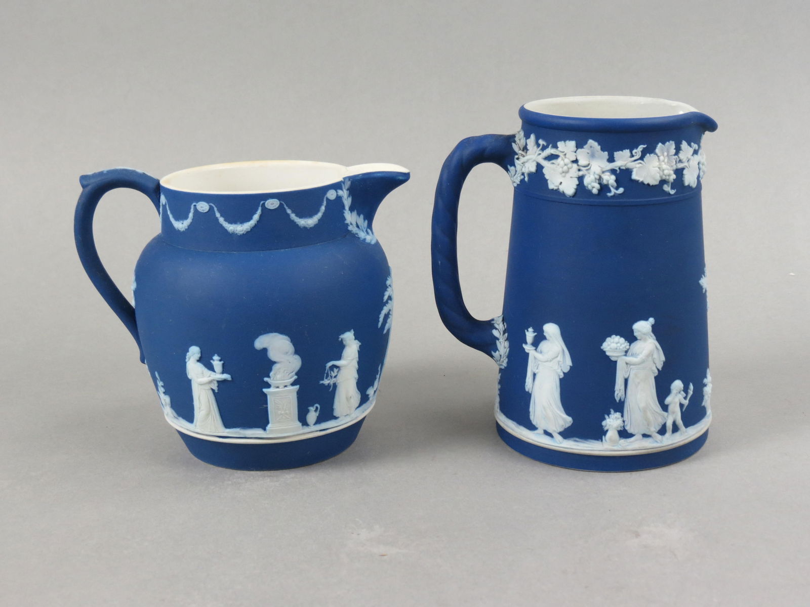 2 Wedgwood Dark Blue Jasperware Pitchers, raised classical style figures and scenes  including (1 of 7)
