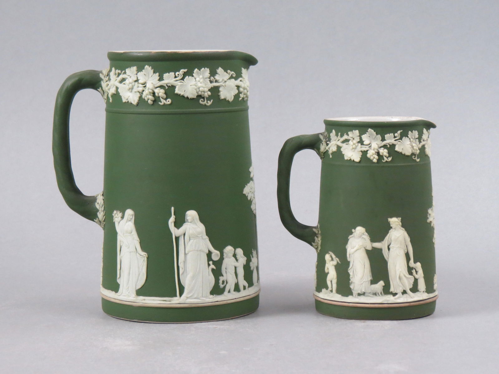 2 Wedgwood Dark Green Jasperware Pitchers, raised classical style figures including maiden  and (1 of 8)