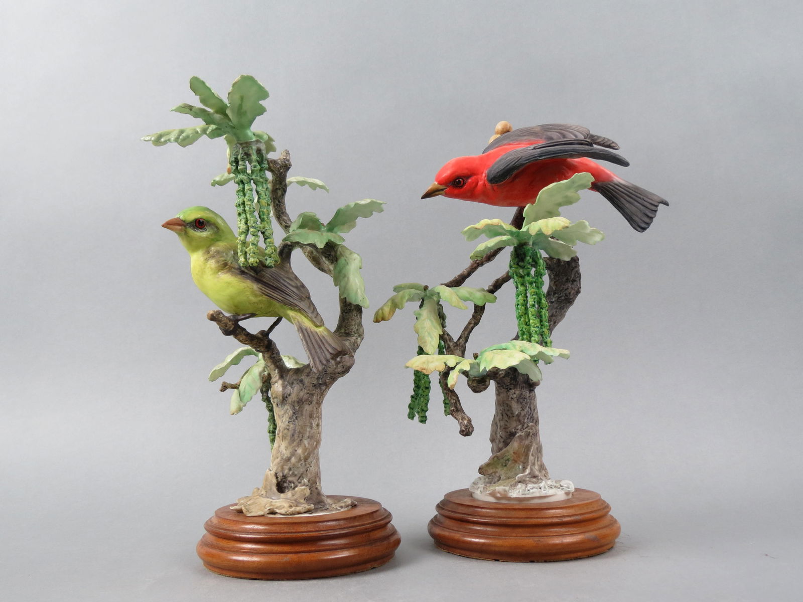 Pair of Royal Worcester Birds by Dorothy Doughty, "Scarlet Tanagers and White Oak", male and female,: Pair of Royal Worcester Birds by Dorothy Doughty, "Scarlet Tanagers and White Oak", male and female, issued in 1956, 12" tall plus wooden bases...le and female, issued in 1964, 6 1/2" plus wood bases.