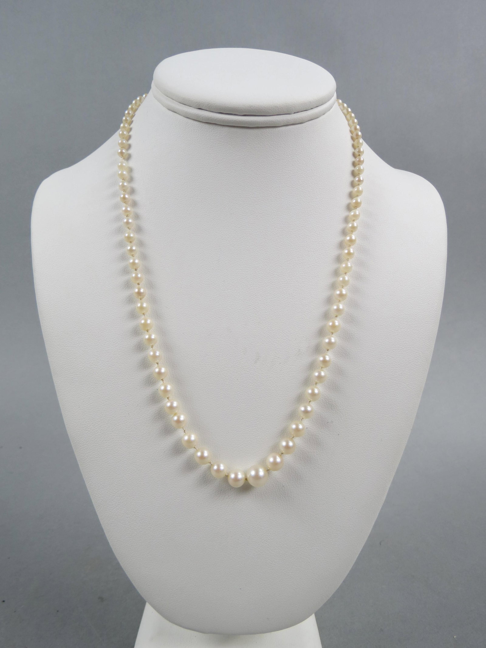 Pearl Necklace, 84 graduated pearls measuring 3 to 8 mm, sterling clasp, 20" long.: Pearl Necklace, 84 graduated pearls measuring 3 to 8 mm, sterling clasp, 20" long.